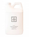 Tangerine dish soap refill bottle with 'Só Clean' branding on a white background